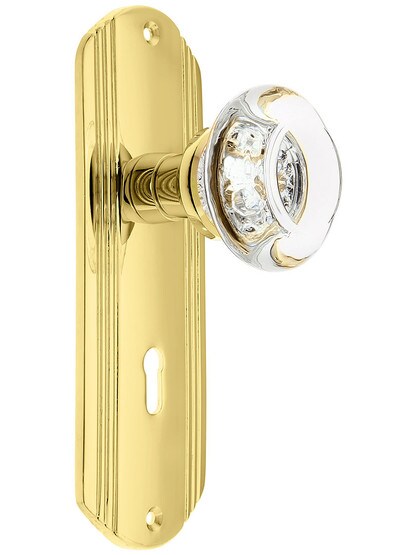 Streamline Deco Door Set with Round Crystal Glass Knobs and Keyhole in Polished Brass.